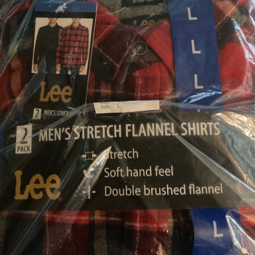Men’s stretch flannel shirts (2) L. One reddish w/ blue. Other grayish black.